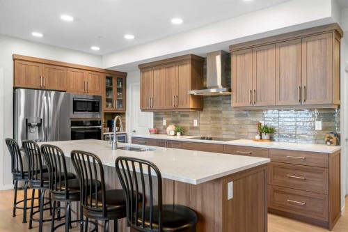 2208-33 Carringham Gate Nw, Calgary, AB - Indoor Photo Showing Kitchen With Double Sink