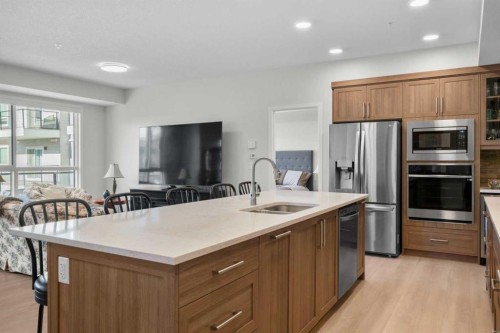 2208-33 Carringham Gate Nw, Calgary, AB - Indoor Photo Showing Kitchen With Double Sink