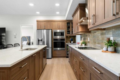 2208-33 Carringham Gate Nw, Calgary, AB - Indoor Photo Showing Kitchen With Upgraded Kitchen