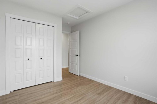 77 Wild Rose Way Se, Calgary, AB - Indoor Photo Showing Other Room