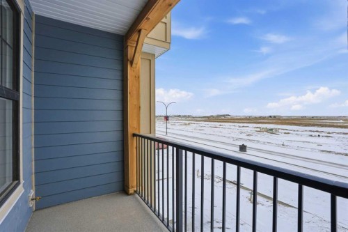 77 Wild Rose Way Se, Calgary, AB - Outdoor With Balcony With Exterior