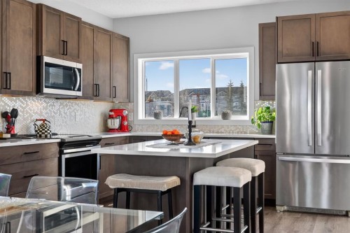 9 Walcrest Gate Se, Calgary, AB - Indoor Photo Showing Kitchen With Stainless Steel Kitchen With Upgraded Kitchen