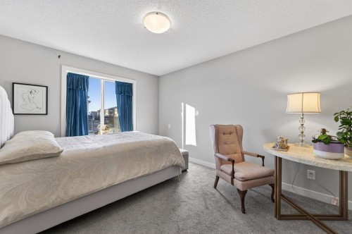9 Walcrest Gate Se, Calgary, AB - Indoor Photo Showing Bedroom