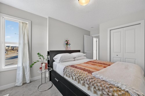 9 Walcrest Gate Se, Calgary, AB - Indoor Photo Showing Bedroom