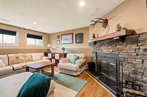 5919 Temple Drive Ne, Calgary, AB - Indoor Photo Showing Living Room With Fireplace