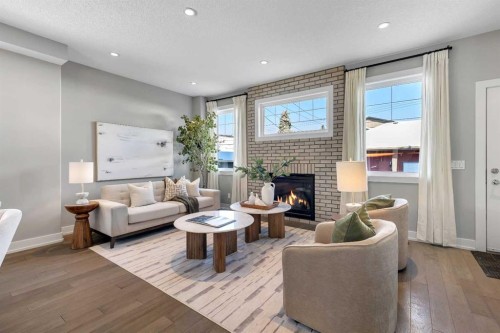 2522 1 Avenue Nw, Calgary, AB - Indoor Photo Showing Living Room With Fireplace
