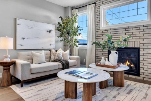 2522 1 Avenue Nw, Calgary, AB - Indoor Photo Showing Living Room With Fireplace