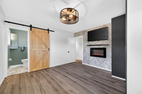 1904 Veiner Street Ne, Calgary, AB - Indoor With Fireplace