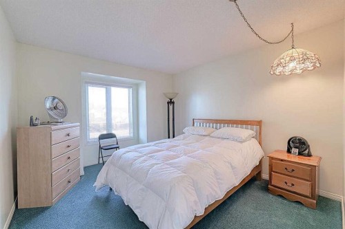 317 Sandringham Road Nw, Calgary, AB - Indoor Photo Showing Bedroom