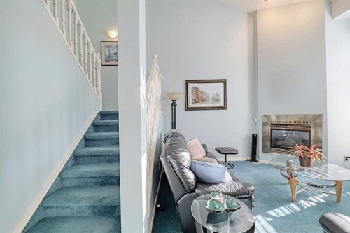 317 Sandringham Road Nw, Calgary, AB - Indoor With Fireplace