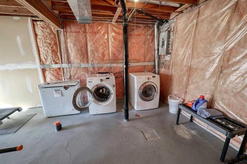 317 Sandringham Road Nw, Calgary, AB - Indoor Photo Showing Laundry Room