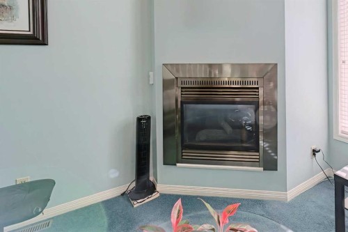 317 Sandringham Road Nw, Calgary, AB - Indoor With Fireplace