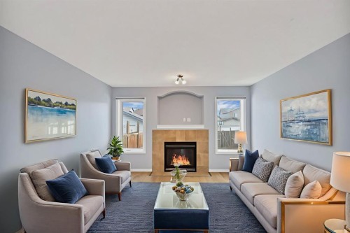 142 Auburn Bay Heights Se, Calgary, AB - Indoor Photo Showing Living Room With Fireplace