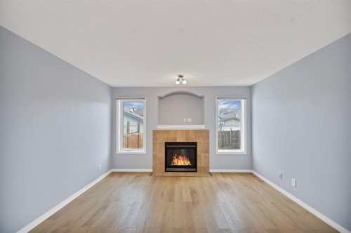 142 Auburn Bay Heights Se, Calgary, AB - Indoor Photo Showing Living Room With Fireplace