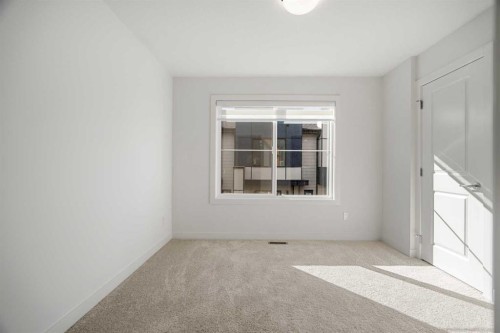 204-550 Seton Circle Se, Calgary, AB - Indoor Photo Showing Other Room