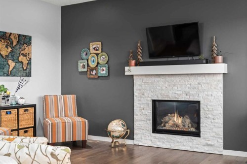 71 Nolanfield Crescent Nw, Calgary, AB - Indoor Photo Showing Living Room With Fireplace