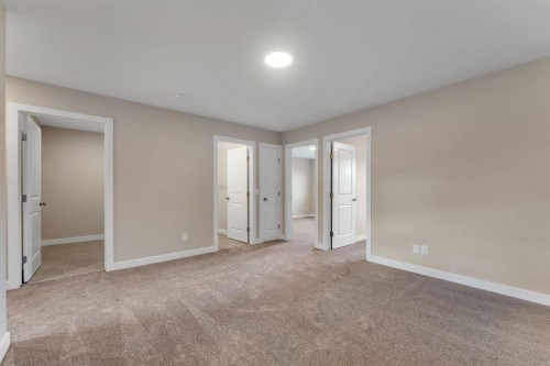 24 Corner Glen Green Ne, Calgary, AB - Indoor Photo Showing Other Room