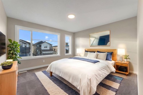 24 Corner Glen Green Ne, Calgary, AB - Indoor Photo Showing Bedroom