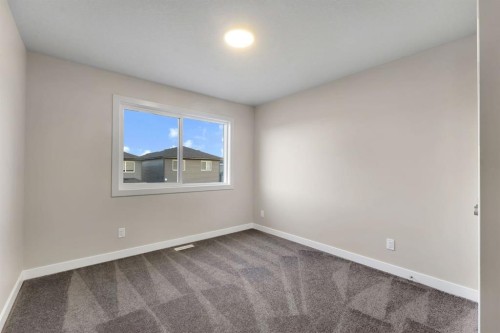 24 Corner Glen Green Ne, Calgary, AB - Indoor Photo Showing Other Room
