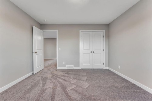 24 Corner Glen Green Ne, Calgary, AB - Indoor Photo Showing Other Room