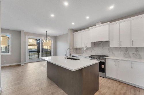 24 Corner Glen Green Ne, Calgary, AB - Indoor Photo Showing Kitchen With Double Sink