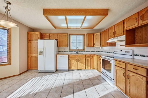 177 Harvest Hills Drive Ne, Calgary, AB - Indoor Photo Showing Kitchen With Double Sink
