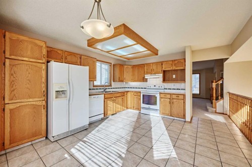 177 Harvest Hills Drive Ne, Calgary, AB - Indoor Photo Showing Kitchen With Double Sink