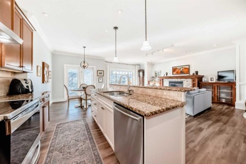 41 Bridle Estates Manor Sw, Calgary, AB - Indoor Photo Showing Kitchen With Upgraded Kitchen