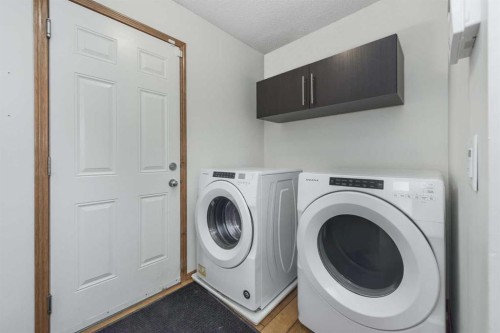 74 Tuscany Springs Hill Nw, Calgary, AB - Indoor Photo Showing Laundry Room