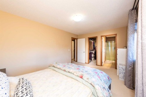 74 Tuscany Springs Hill Nw, Calgary, AB - Indoor Photo Showing Bedroom