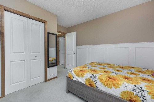 74 Tuscany Springs Hill Nw, Calgary, AB - Indoor Photo Showing Bedroom