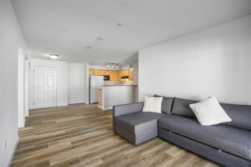 2205-70 Panamount Drive Nw, Calgary, AB - Indoor Photo Showing Living Room
