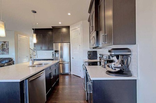 1708 Monteith Drive Se, High River, AB - Indoor Photo Showing Kitchen With Double Sink With Upgraded Kitchen