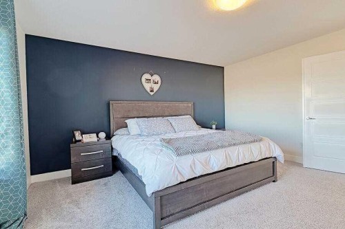 1708 Monteith Drive Se, High River, AB - Indoor Photo Showing Bedroom