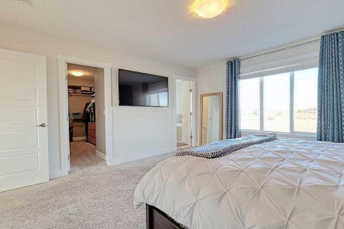 1708 Monteith Drive Se, High River, AB - Indoor Photo Showing Bedroom