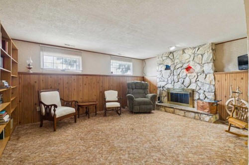 11427 Wilkes Road Se, Calgary, AB - Indoor With Fireplace