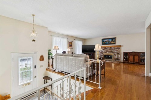 11427 Wilkes Road Se, Calgary, AB - Indoor With Fireplace