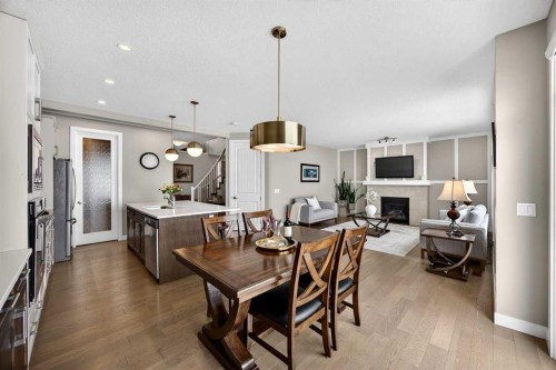 144 Sundown View, Cochrane, AB - Indoor With Fireplace
