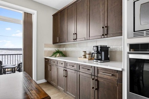 144 Sundown View, Cochrane, AB - Indoor Photo Showing Kitchen