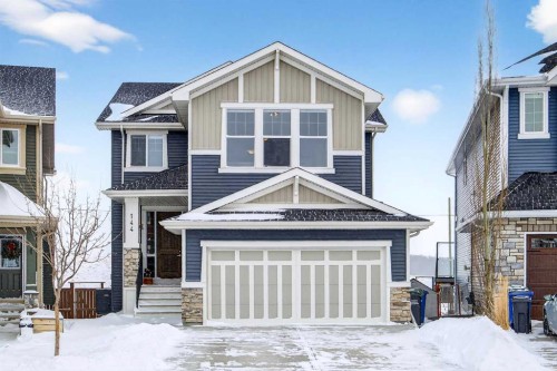 144 Sundown View, Cochrane, AB - Outdoor With Facade
