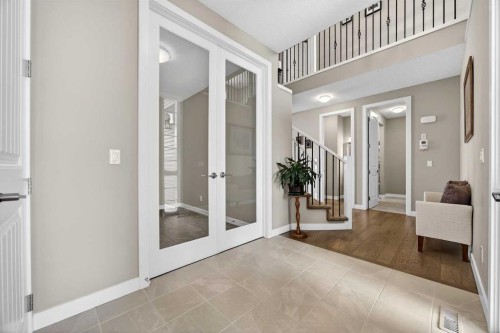 144 Sundown View, Cochrane, AB - Indoor Photo Showing Other Room