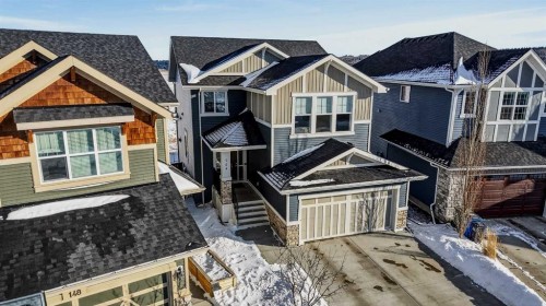 144 Sundown View, Cochrane, AB - Outdoor With Facade