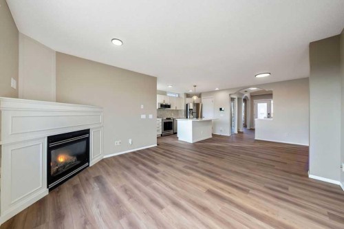 14 Tuscany Springs Rise Nw, Calgary, AB - Indoor Photo Showing Living Room With Fireplace