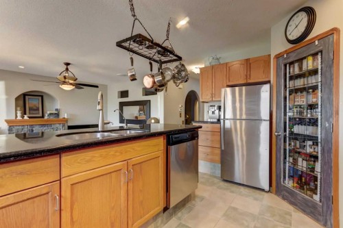208 Railway Avenue, Cheadle, AB - Indoor Photo Showing Kitchen With Stainless Steel Kitchen With Double Sink