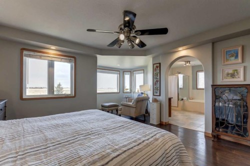 208 Railway Avenue, Cheadle, AB - Indoor Photo Showing Bedroom