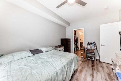 108-71 Shawnee Common Sw, Calgary, AB - Indoor Photo Showing Bedroom