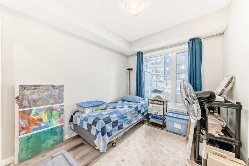 108-71 Shawnee Common Sw, Calgary, AB - Indoor Photo Showing Bedroom