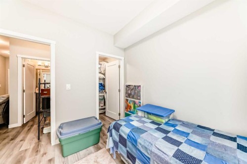 108-71 Shawnee Common Sw, Calgary, AB - Indoor Photo Showing Bedroom