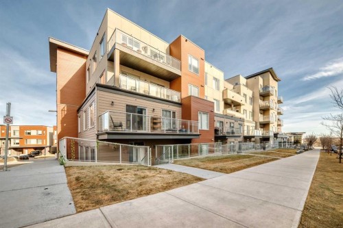 108-71 Shawnee Common Sw, Calgary, AB - Outdoor With Facade