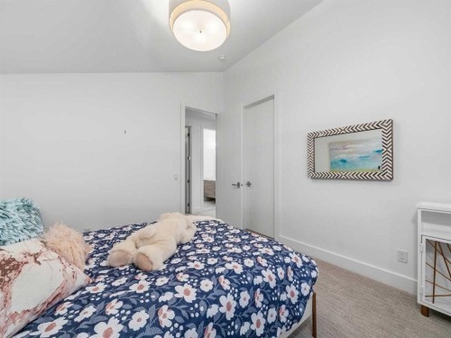 80 Cranbrook Heights Se, Calgary, AB - Indoor Photo Showing Bedroom